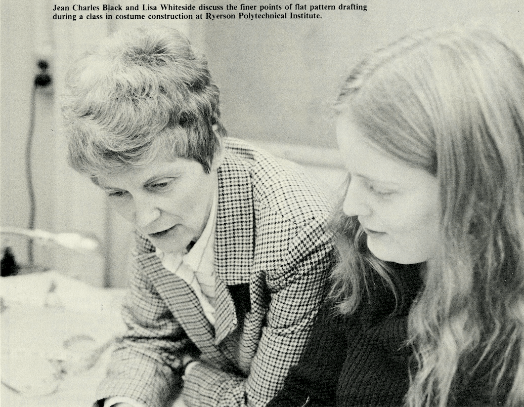 a teacher helps a younger student